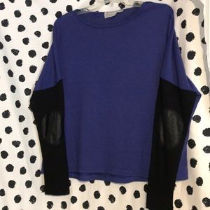 Purple blue light sweater with faux leather patch.